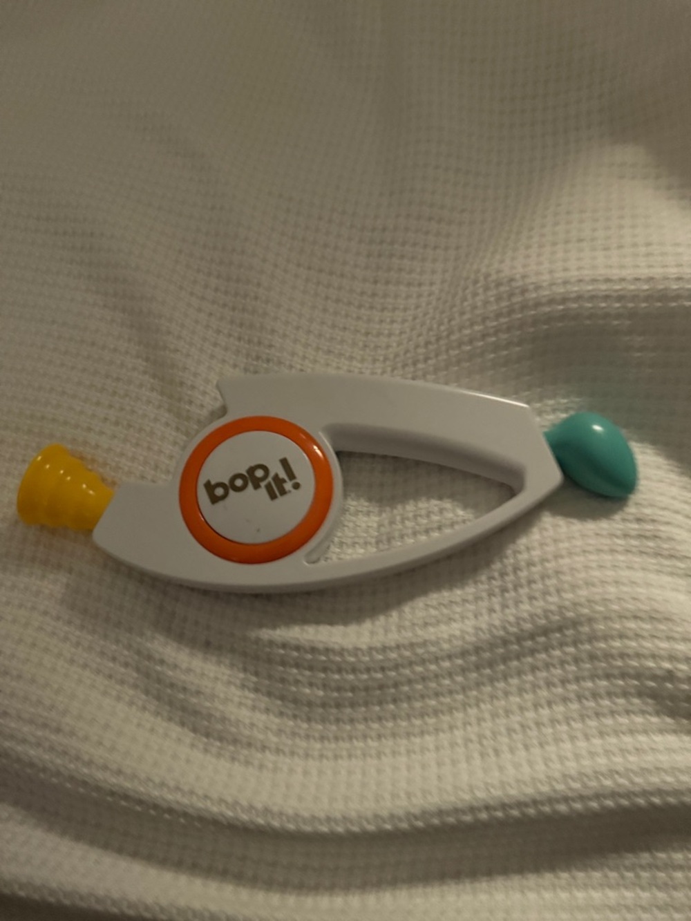 Bop It! Handheld Game — White with Orange, Yellow & Teal Accents